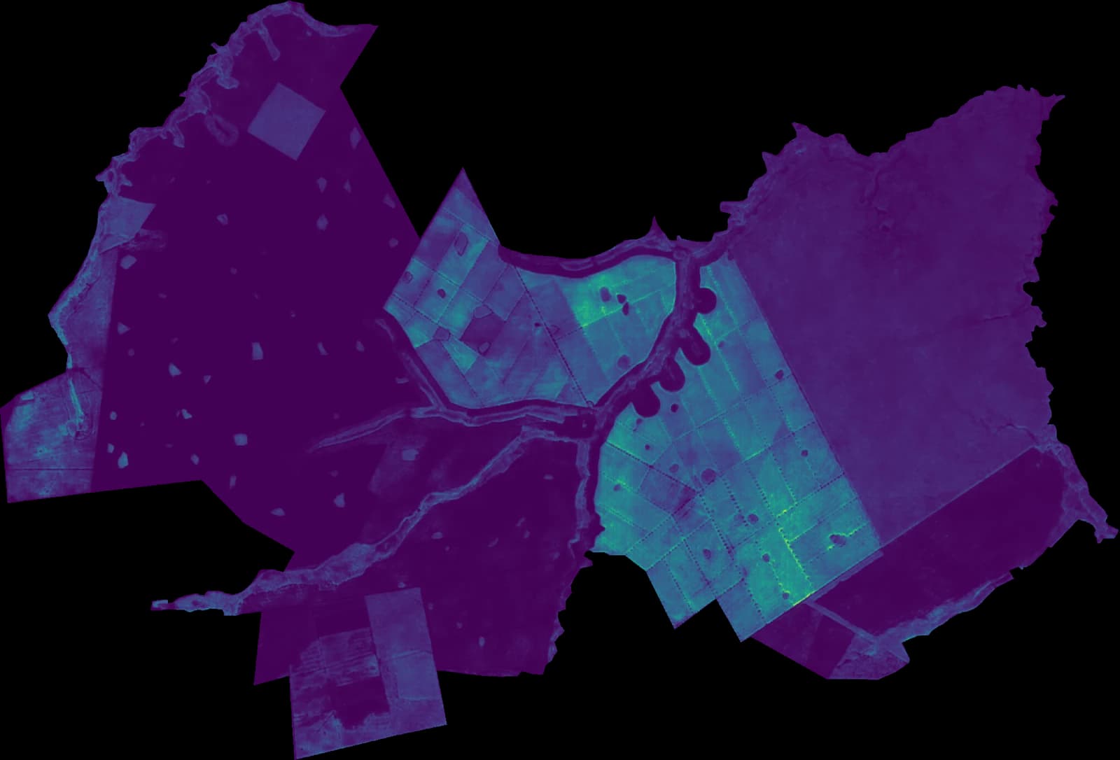 The same site with field data in the model: most of it reads lower, the central compartments most of all, and a few western blocks higher